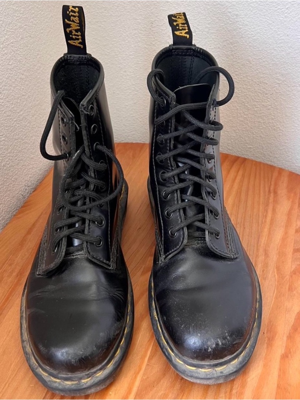 Dr. Martens Black Leather 8-Eye Lace-Up Boots with Yellow Stitching